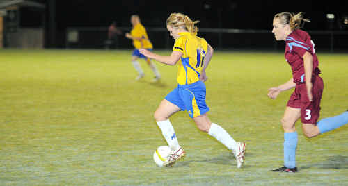 Gympie Miners’ Ella Flack takes the ball past her Coolum opponent at One Mile earlier in the season. Gympie Miners’ Ella Flack takes the ball past her Coolum opponent at One Mile earlier in the season.